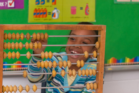 A child with a abacus
