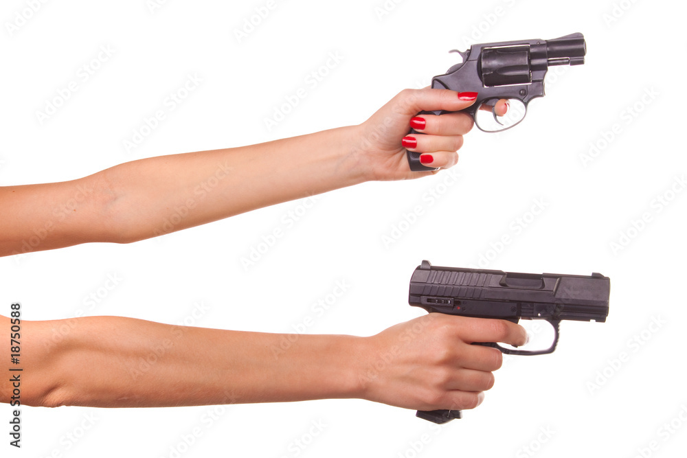 Wall mural Woman's hand with a gun