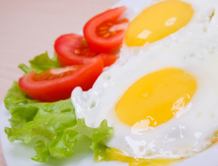 Delicious egg with vegetable close up .