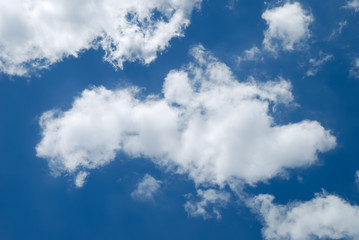 Soft white clouds against blue sky