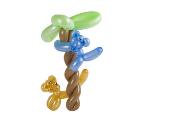 Balloon animal cat and monkey in tree