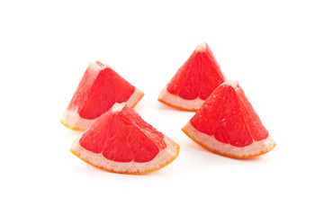 fresh grapefruit fruit with cut isolated on white