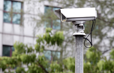 A surveillance camera monitoring road traffic