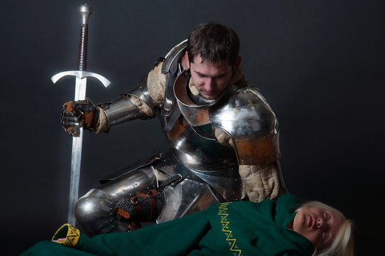 Great knight looking at dead  body