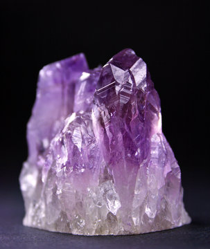 druses amethyst on a dark background