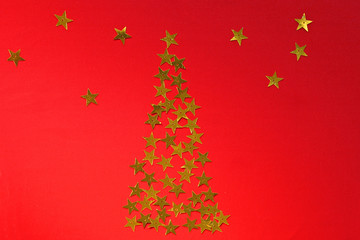 Fototapeta na wymiar Christmas red background with stars tree