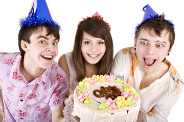 Group of teenagers with cake celebrate happy birthday.