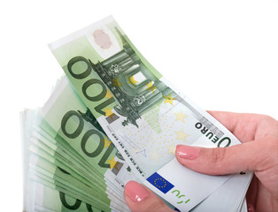 Money euro in female hand. Isolated.