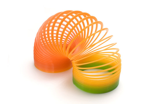 isolated plastic spring toy in white background