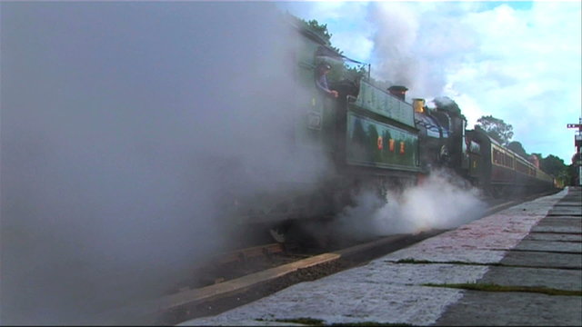 Steam train ( double header ) at the station