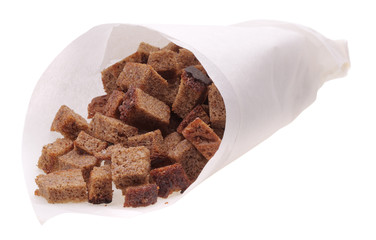 dried crust from rye bread in paper bag