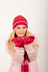 young winter woman in bright red gloves