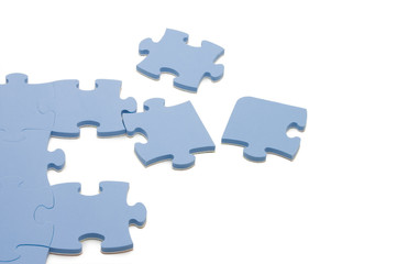 Fototapeta premium Dropped out part of a blue puzzle