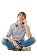 Young man talking by mobile phone