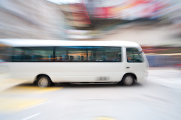 Fototapeta na wymiar Fast moving bus