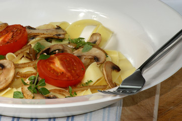 home made tagliatelle with organic tomato and onion
