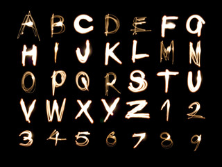 Light painting illustration of the alphabet and numbers 1 to 9 - obrazy, fototapety, plakaty