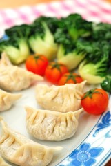 Chinese dumplings and vegetables