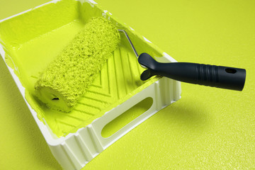 Roller with yellow paint