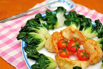 Chinese dumplings and vegetables