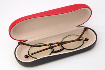 Eye glasses in a case isolated on white
