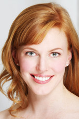 Naklejka premium lovely redhead with natural smile