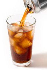 Soda pouring into a pint glass