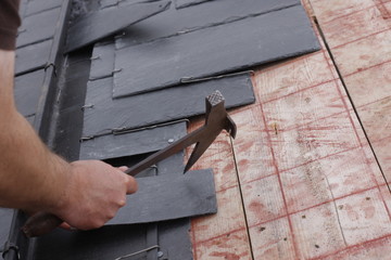 roofer made a roof with slates
