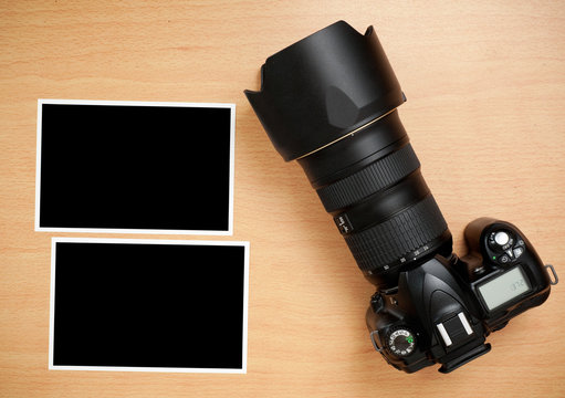SLR Camera and blank photo ptints