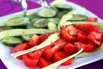 Tomatoes and cucumbers in a plate