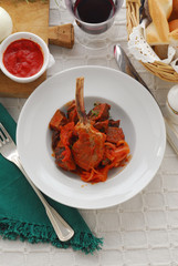 Capretto in salsa di pomodoro - Secondi Emilia Romagna