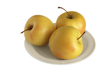 Three yellow apples on white plate