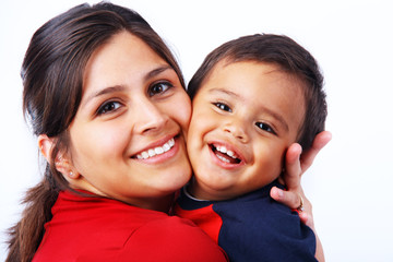 Happy Mother Hugging Son Tightly