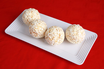 Popcorn balls on a red background