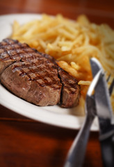steak on a wooden table
