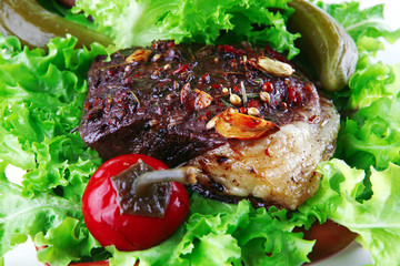 roast meat on salad