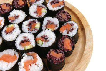 sushi on wooden plate