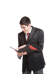 Confident businessman with notebook