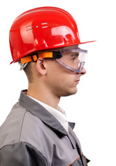Serious architect, or engineer in red hardhat