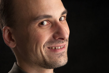 Close-up portrait of a smiling man