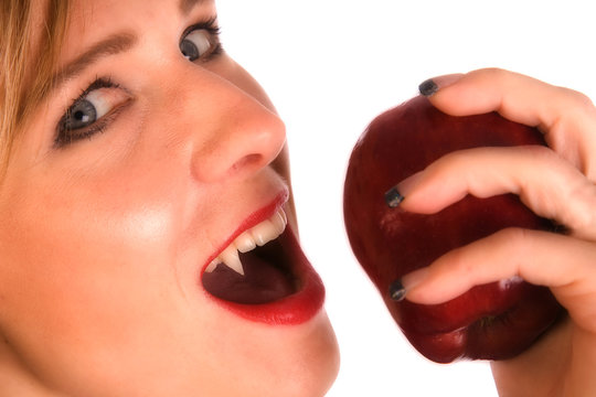 woman vampire eating apple