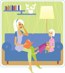 Young mother reading book to her daughter