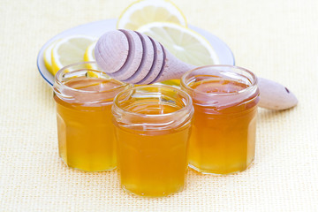 honey, lemon and wooden drizzler