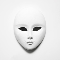 white mask on white paper; square format