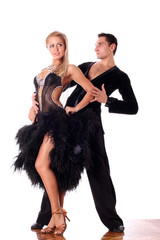 dancers in ballroom against white background