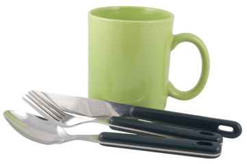 green mug and cutlery isolated on white background