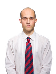 Portrait of the young man with a tie on a white background