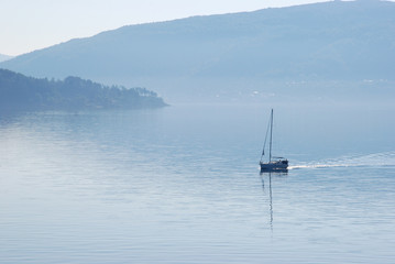 Sailboat in mist