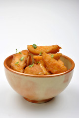 some fried potato wedges in a bowl