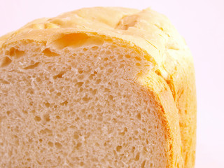 The cut bread on a white background